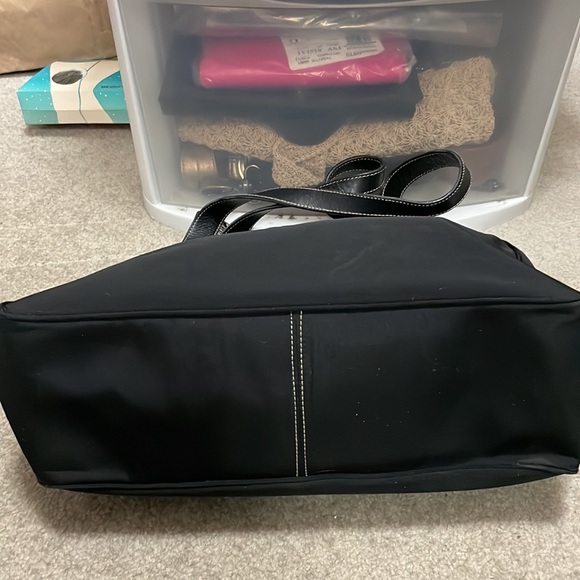 RLL on this lightly used bag, black material and black leather shoulder straps. - Picture 5 of 8